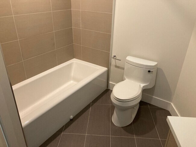 Building Photo - Live at the beach! Modern 2 bedroom 2 bath condo blocks from the beach w/parking and washer/dryer...