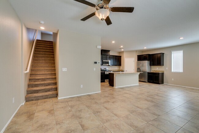 Building Photo - Spacious Townhouse with Loft & Rare 3-Car Garage!
