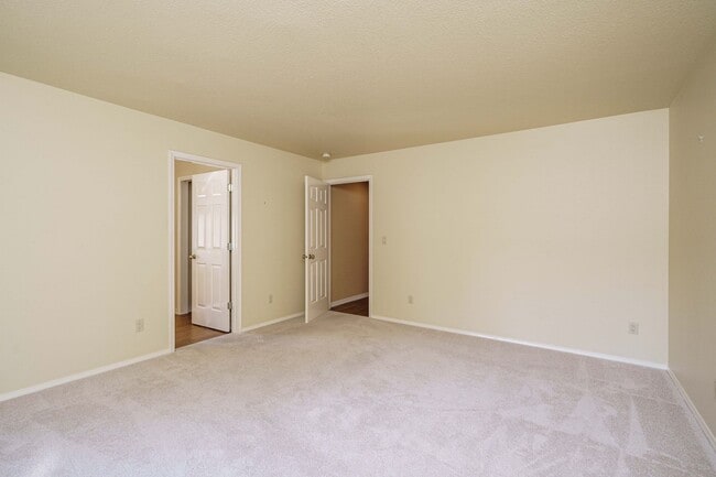 Building Photo - Beautifully Landscaped 1/4 acre with Well Maintained 4 bedroom 2 Bath Home with 3 Car Garage
