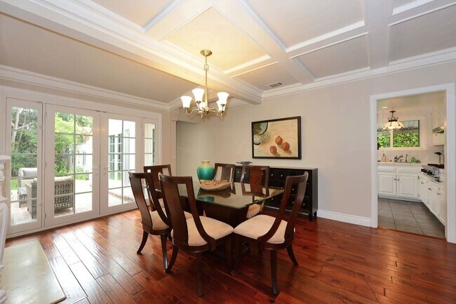 Building Photo - Welcome to this beautifully updated Spanis...