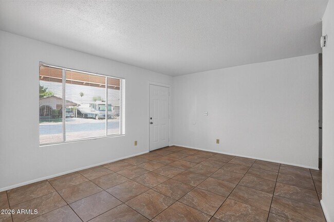 Building Photo - 6320 W Carol Ave