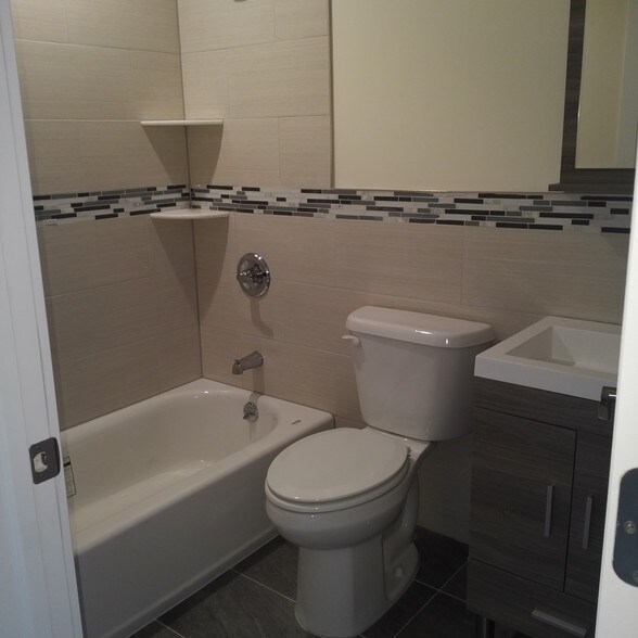 Modern baths - 6119 Newkirk Ave