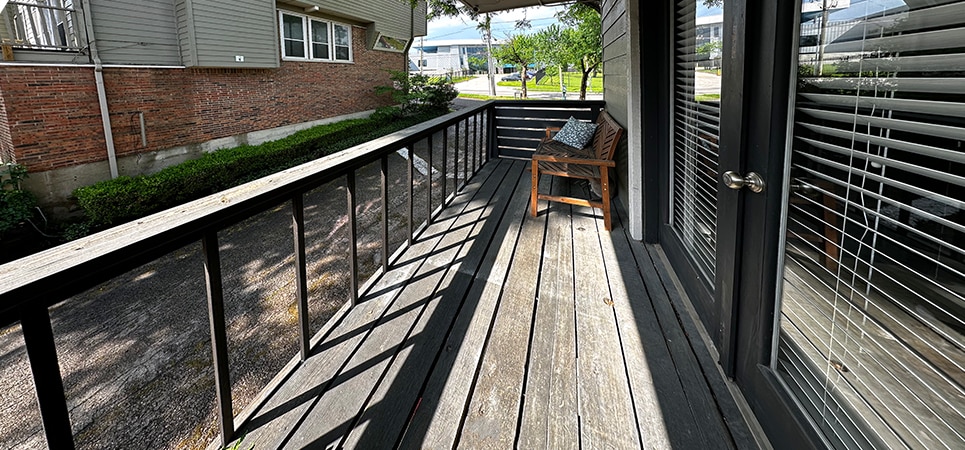 French doors in the kitchen open to this covered balcony - perfect for a kitchen garden - 8710 Park Ln