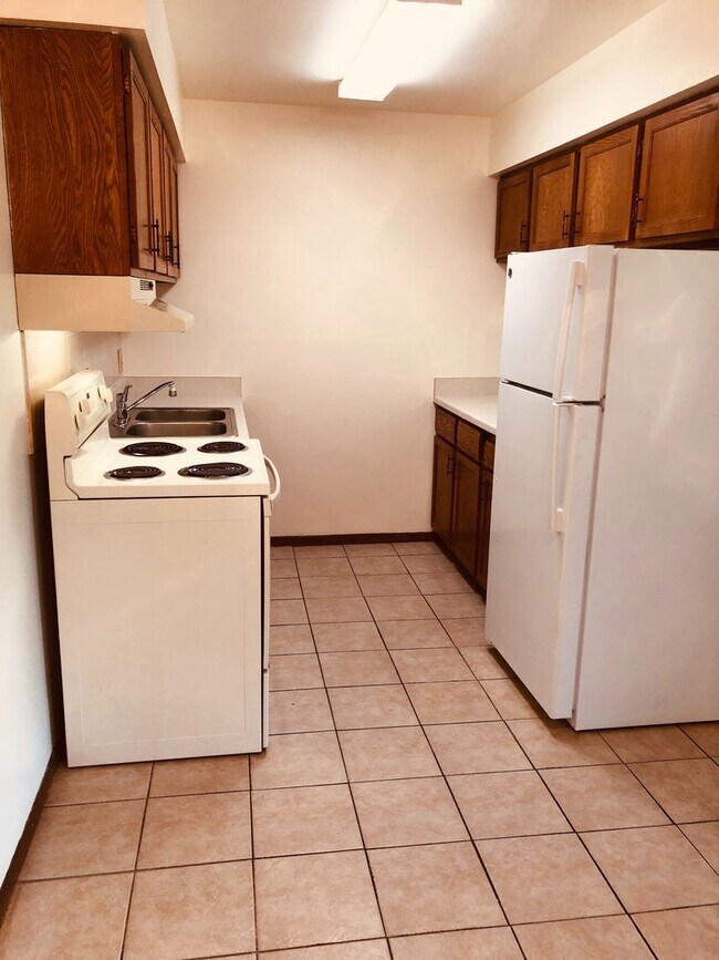 Building Photo - Spruce Court Apartment - Greenfield WI - Call 262-420-0390 to schedule a showing