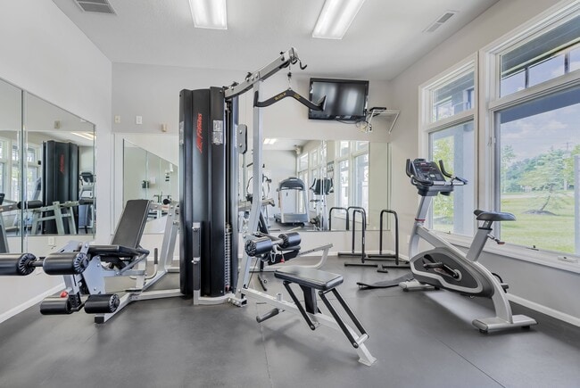 Crush your fitness goals with a full range of equipment—treadmills, weights, and more - Catalina Club Apartments
