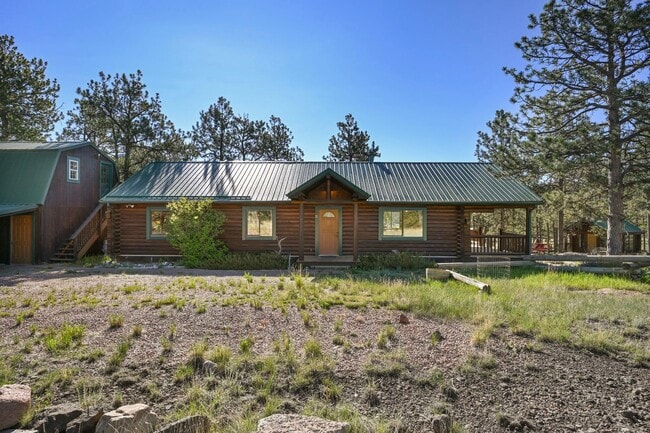 Building Photo - 3 bed 2 Bath Log Home on 2 Acres in Florissant