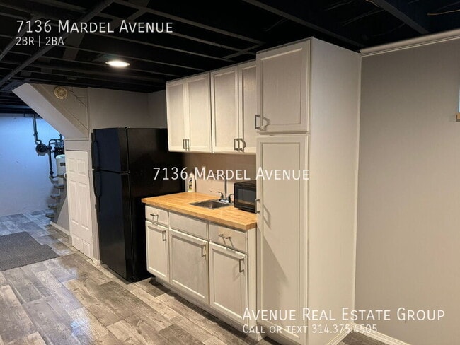 Building Photo - 7136 Mardel Ave