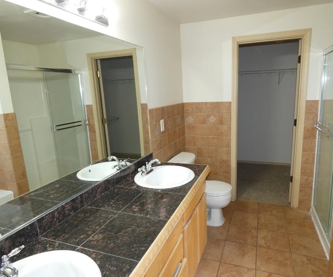 Building Photo - Spacious 4 BR/ 2.5BA