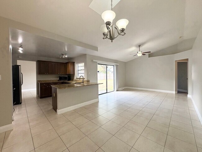 Building Photo - 4B/2B Home in Oviedo ~ Carpet Free ~ Top Rated Schools