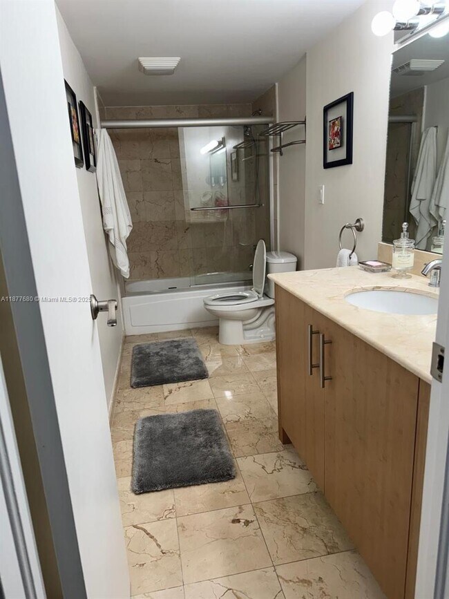 Building Photo - 10275 Collins Ave