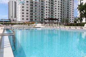 Building Photo - 5005 Collins Ave