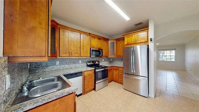 Building Photo - 5660 NW 115th Ct