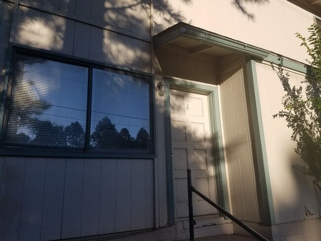 Building Photo - $100 OFF 1st Month! Updated 2 Bed, 1 Bath Townhouse next to NAU!! Students & Sm. Pets OK !! Avail...