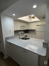 Building Photo - Oaks III - E104