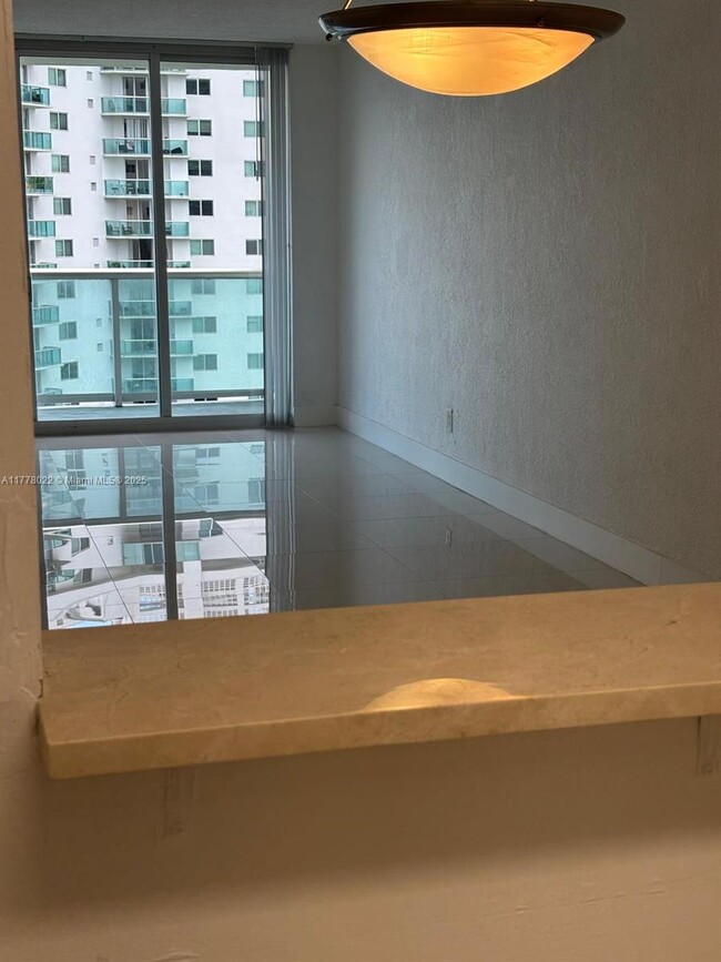 Building Photo - 19390 Collins Ave