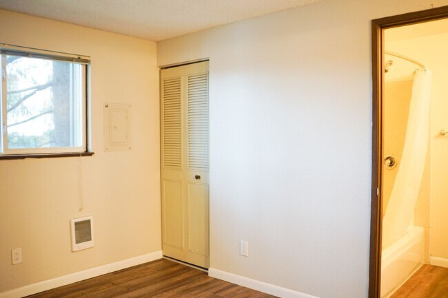 Building Photo - Spacious 1-Bed Surrounded by Tall Trees & Just Blocks from Popular Multnomah Village!