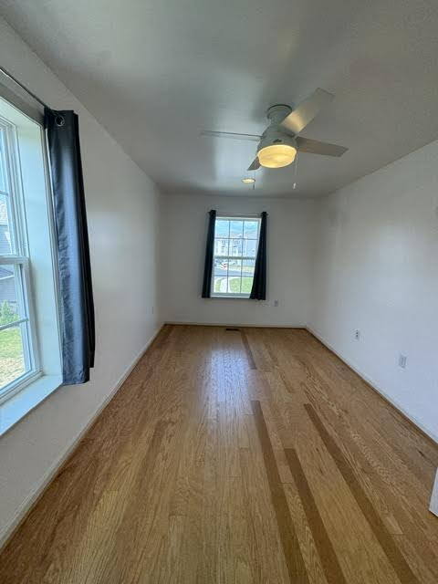 Building Photo - Modern End-Unit Townhome – Solar Powered, Garage, Pet Friendly, and HOA Amenities Included
