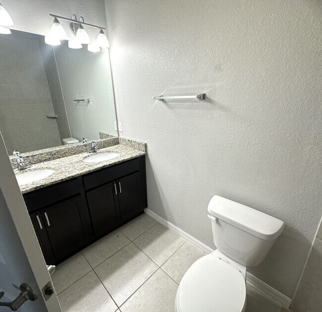 Building Photo - Available Mid April!! NW CAPE CORAL 3 BEDROOM 2 BATHROOM 2 CAR GARGAGE