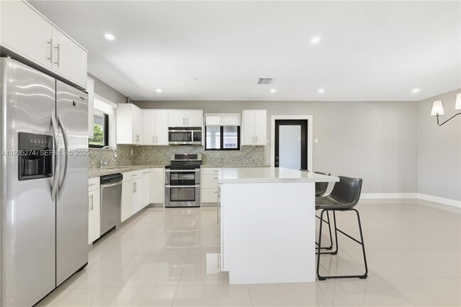 Building Photo - 4165 W 5th Ln