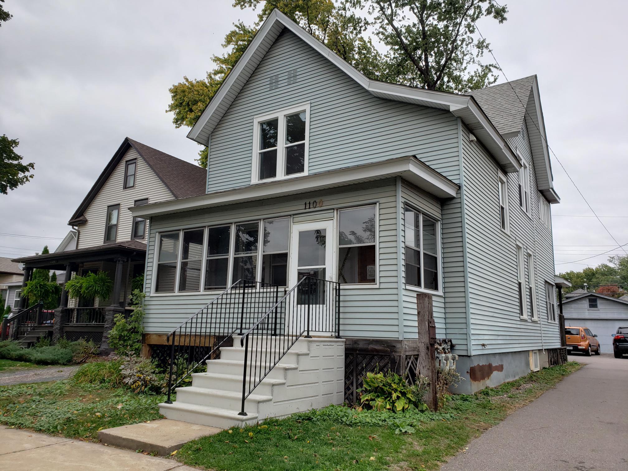 Front - new siding being put on - 1100 15th Ave SE