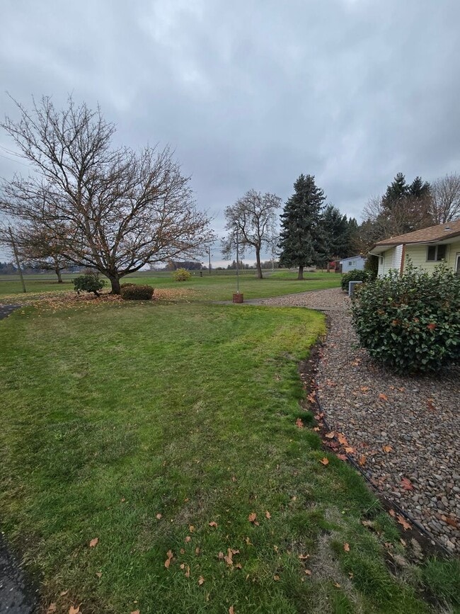 Building Photo - Pet Friendly 3 Bed / 2Bath Home with 2 Garages, Open Air Covered Storage, Large Open Yard, and more!