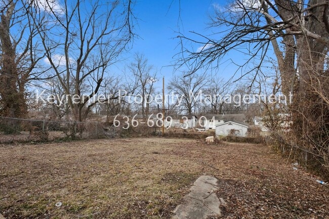 Building Photo - COMING SOON - Charming 3-Bedroom Home with Spacious Yard in North St. Louis County