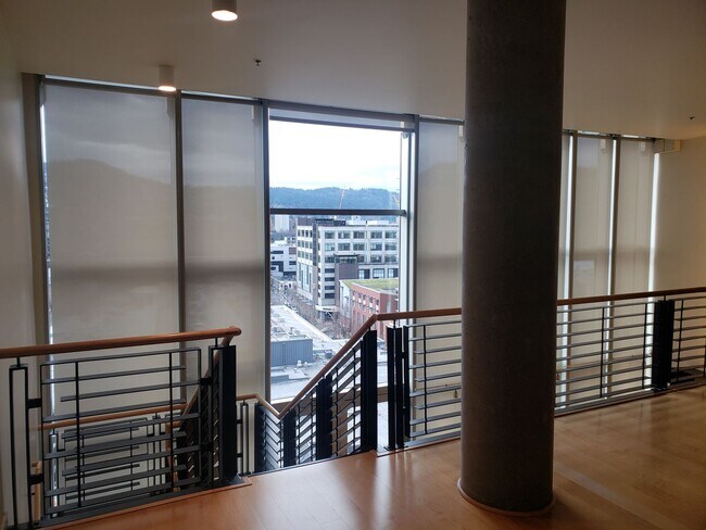 Building Photo - Wonderful Two story Penthouse Condo! Water...