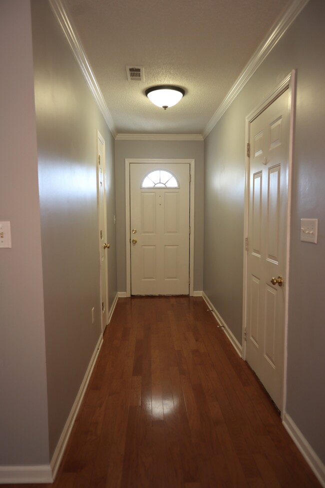 Entrance (L-R: coat closet, front door, garage door) - 11 Madera Trl