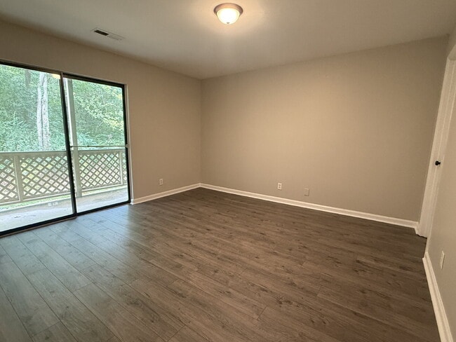 Building Photo - "Cozy 2-Bed Condo in Huntsville with Firep...
