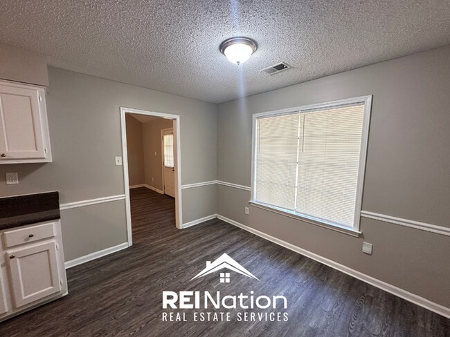 Building Photo - CORDOVA COVE CHARMER! 3BR/2BA | High Ceilings & Brick Fireplace | 2-Car Garage!