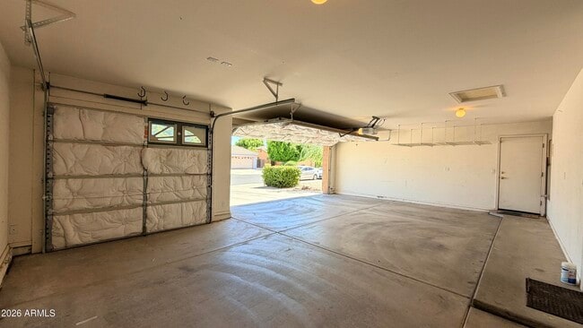 Building Photo - 8638 E Osage Ave