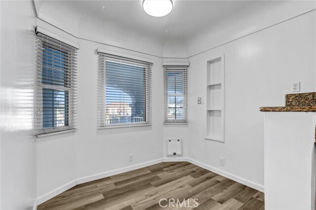 Building Photo - 9807 S Denker Ave