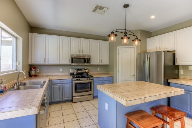 Building Photo - Located in Mesquite Ranch and the Award Wi...