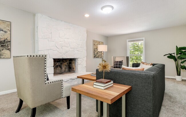 Den with wood burning fireplace - 1329 Paragon Pky