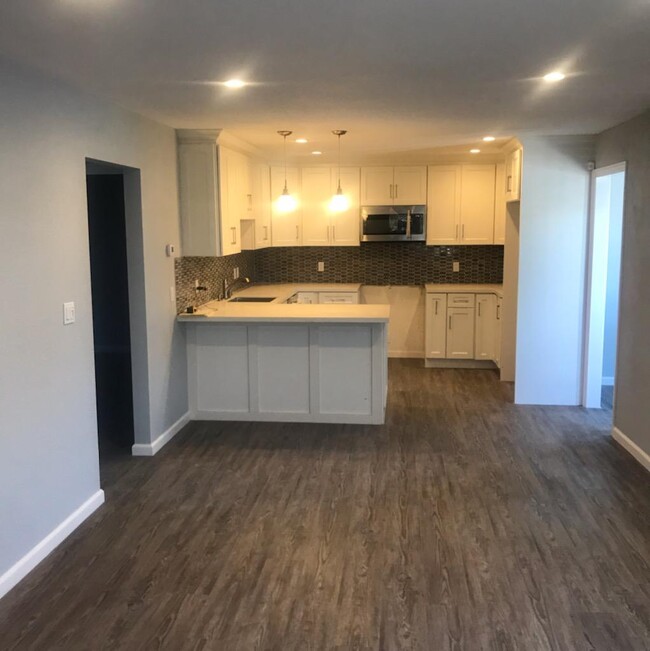 Kitchen is brand new and will incude all brand new stainless steel top of the line Samsung appliances. Garbage disposal, dishwasher, stove, microwave, and refrigerator. All lights have dmmable switches. Modern coler scheme with brand new shaker white cabinets. - 1450 166th Ave