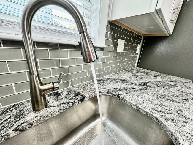 Building Photo - Updated & Ready For You NOW! A Pet-Friendly Home w/Attached Garage, All Appliances Convey - HUGE ...