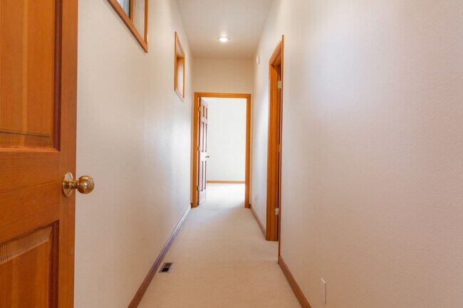 Building Photo - Private river access and stunning views from this home on Harmon Blvd! + Bonus Room