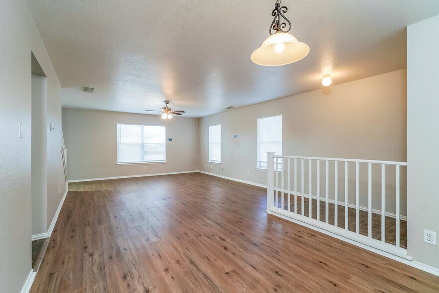 Building Photo - 6631 Highland Grass