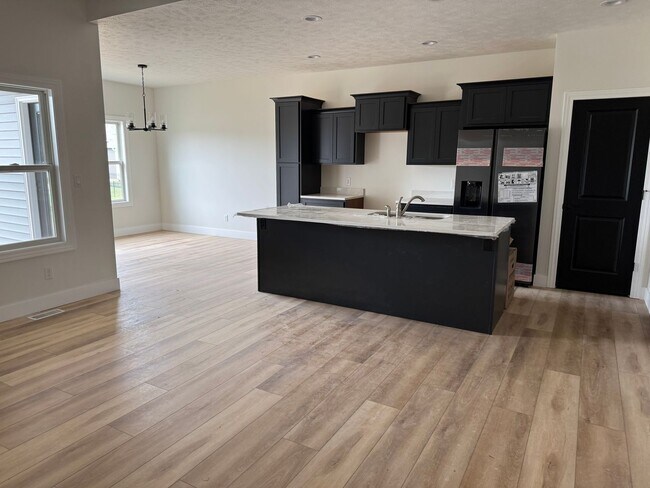 Building Photo - New Construction! West side location. 4br, 3bth, 2crg, Finished basement. All new stainless steel...