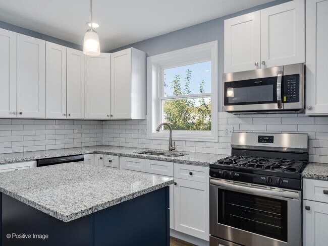 Building Photo - 5156 S Spaulding Ave