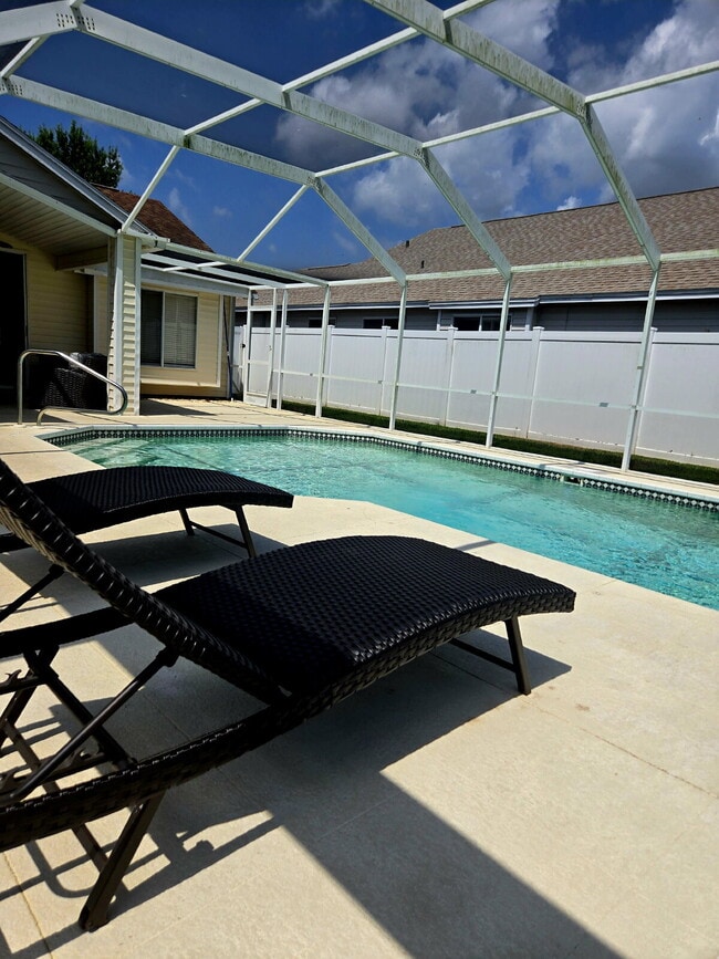 Building Photo - This 3/2 pool home is located at beautiful...