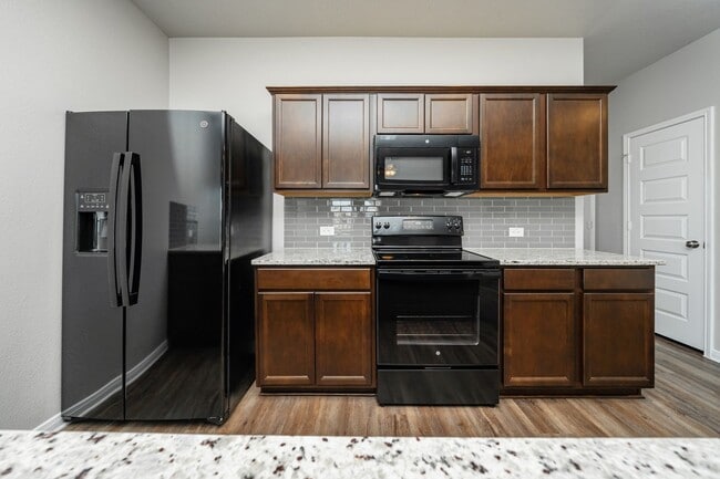 Building Photo - Spacious Townhome Available Now!