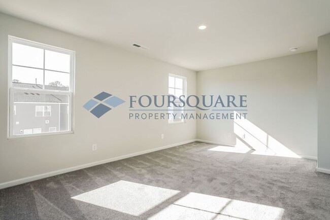 Building Photo - New Three-Story Townhome | 1st Level Guest...