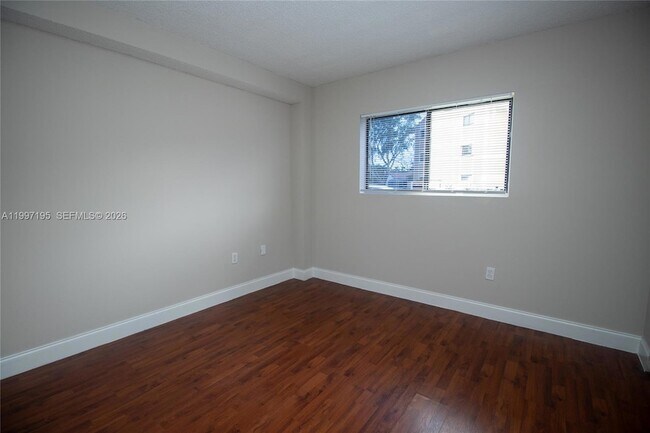 Building Photo - 9491 Palm Cir S
