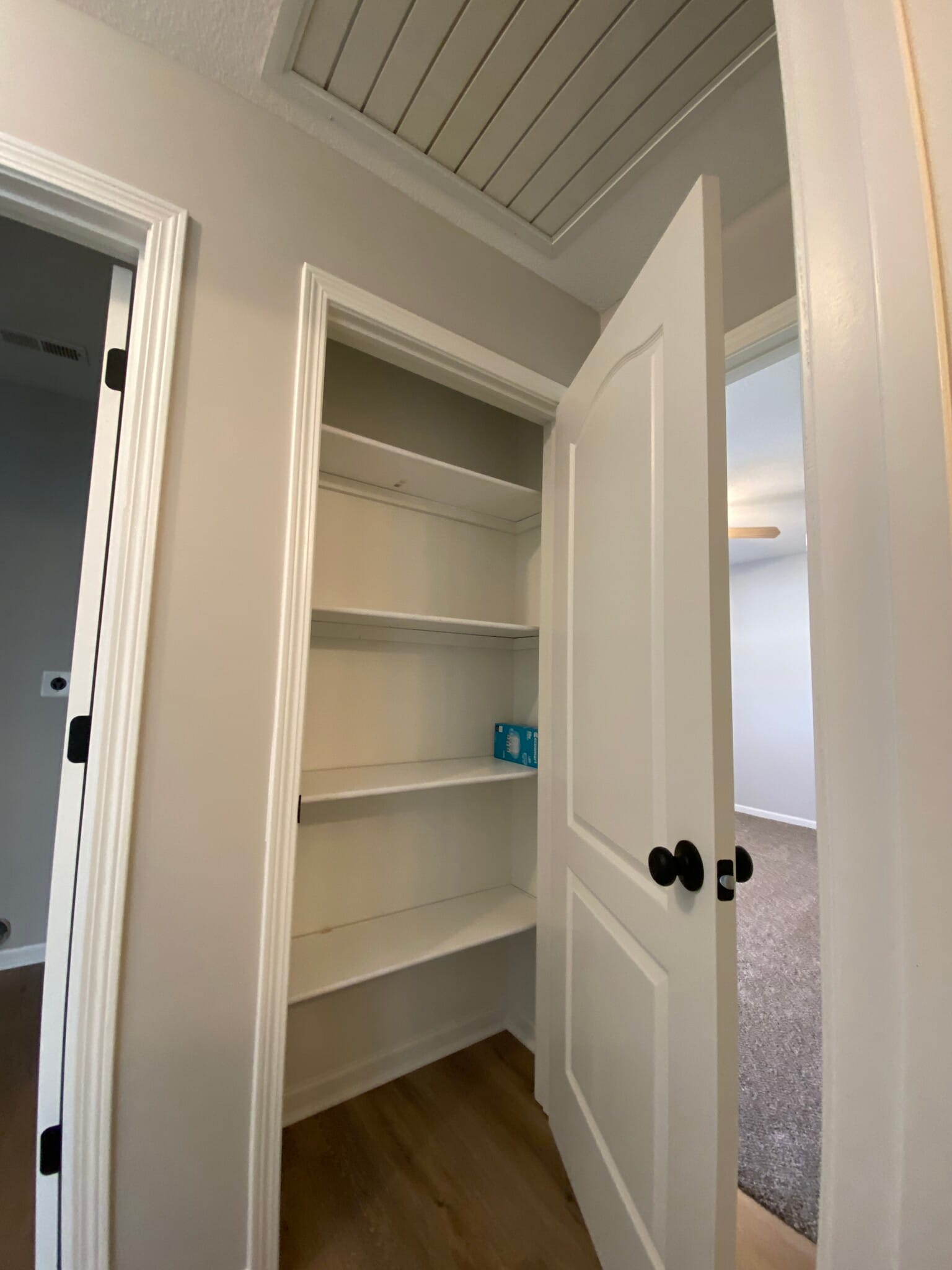 Linen closet - 220 SW Chartwell Cir