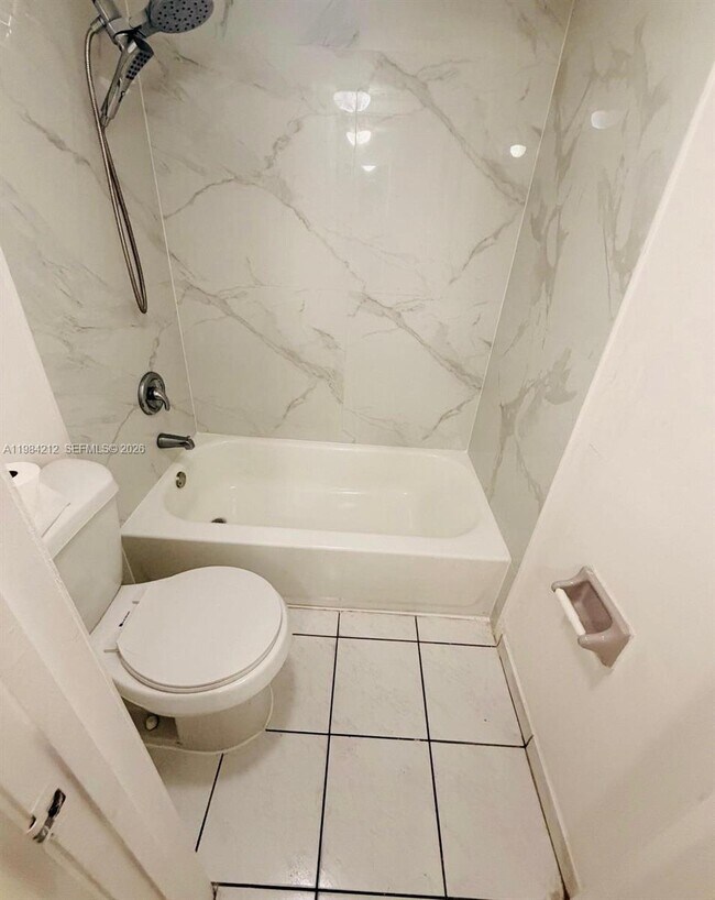 Building Photo - 6395 W 22nd Ct