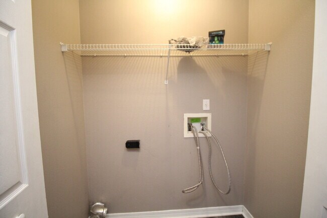 Building Photo - 2BR Patio Home with LVP Flooring, Private Fenced Yard, & Convenient Blue Angel Pkwy Location Near...