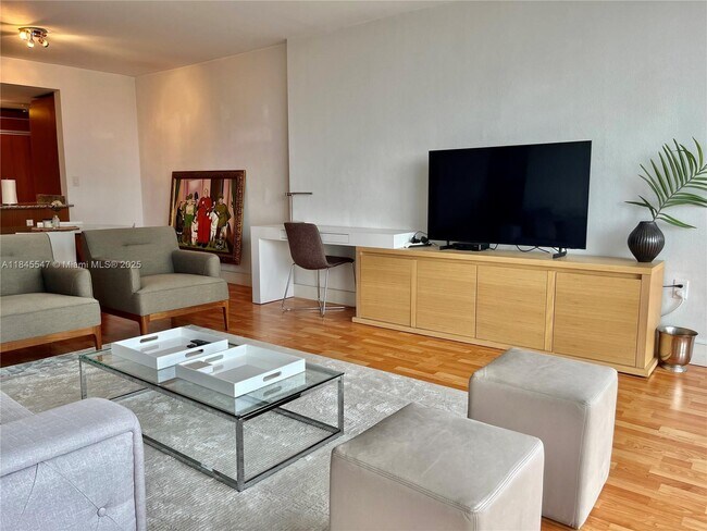 Building Photo - 10275 Collins Ave