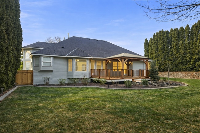 Building Photo - Executive 3 Bed Home with 3 Car Garage & Private Fenced Yard