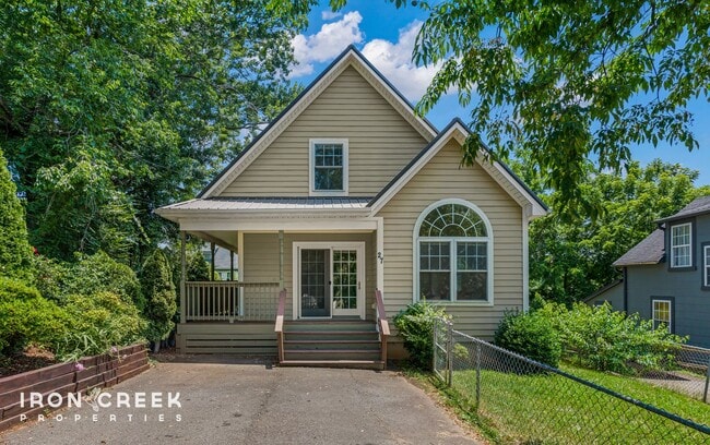 Primary Photo - Charming Three-Bedroom Home with Solar Pow...